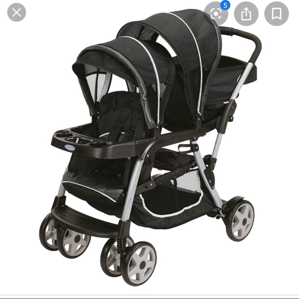 A double Stroller used for infant and toddler .